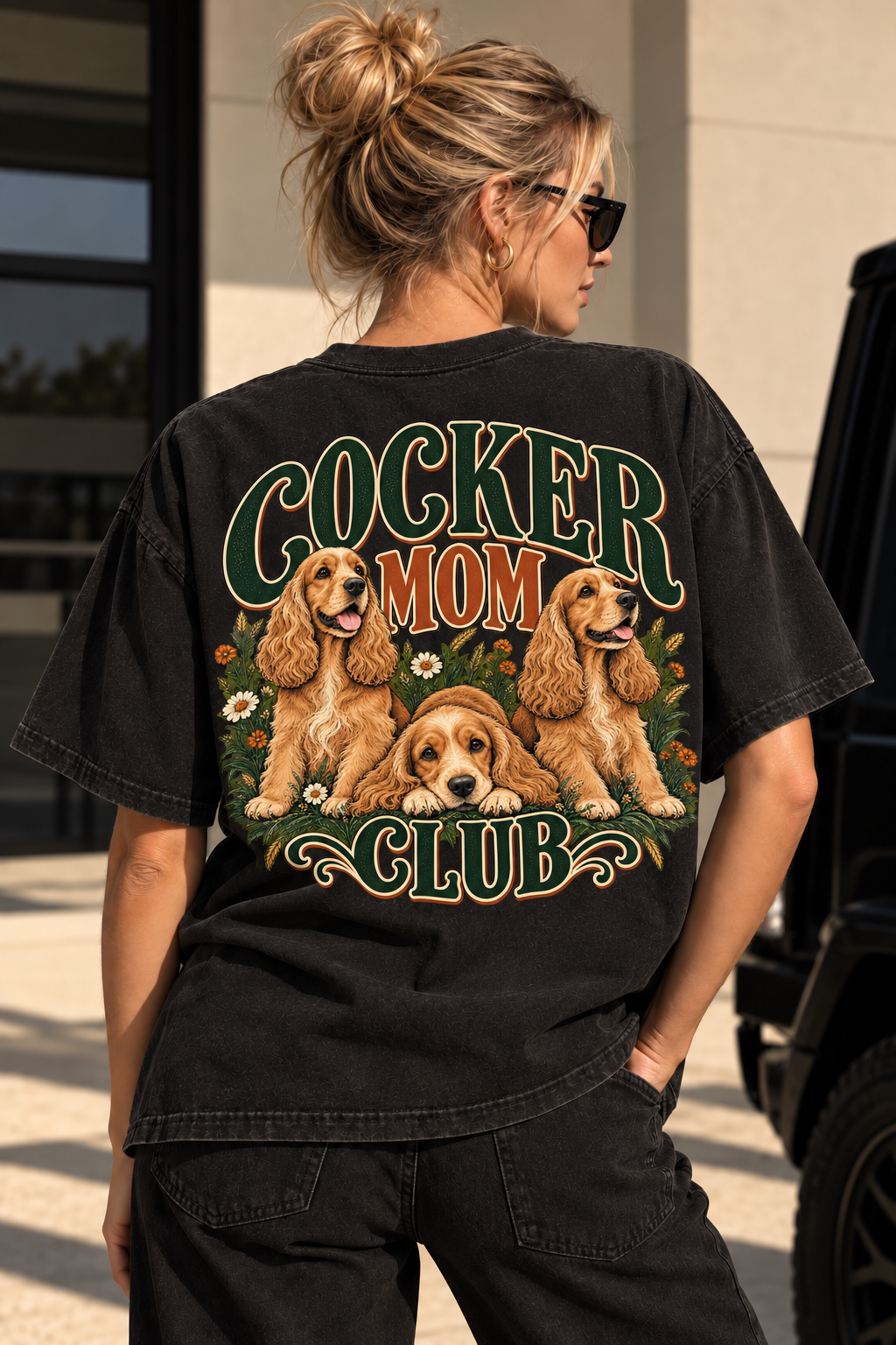 Cocker Mom Club — dos porté par une femme