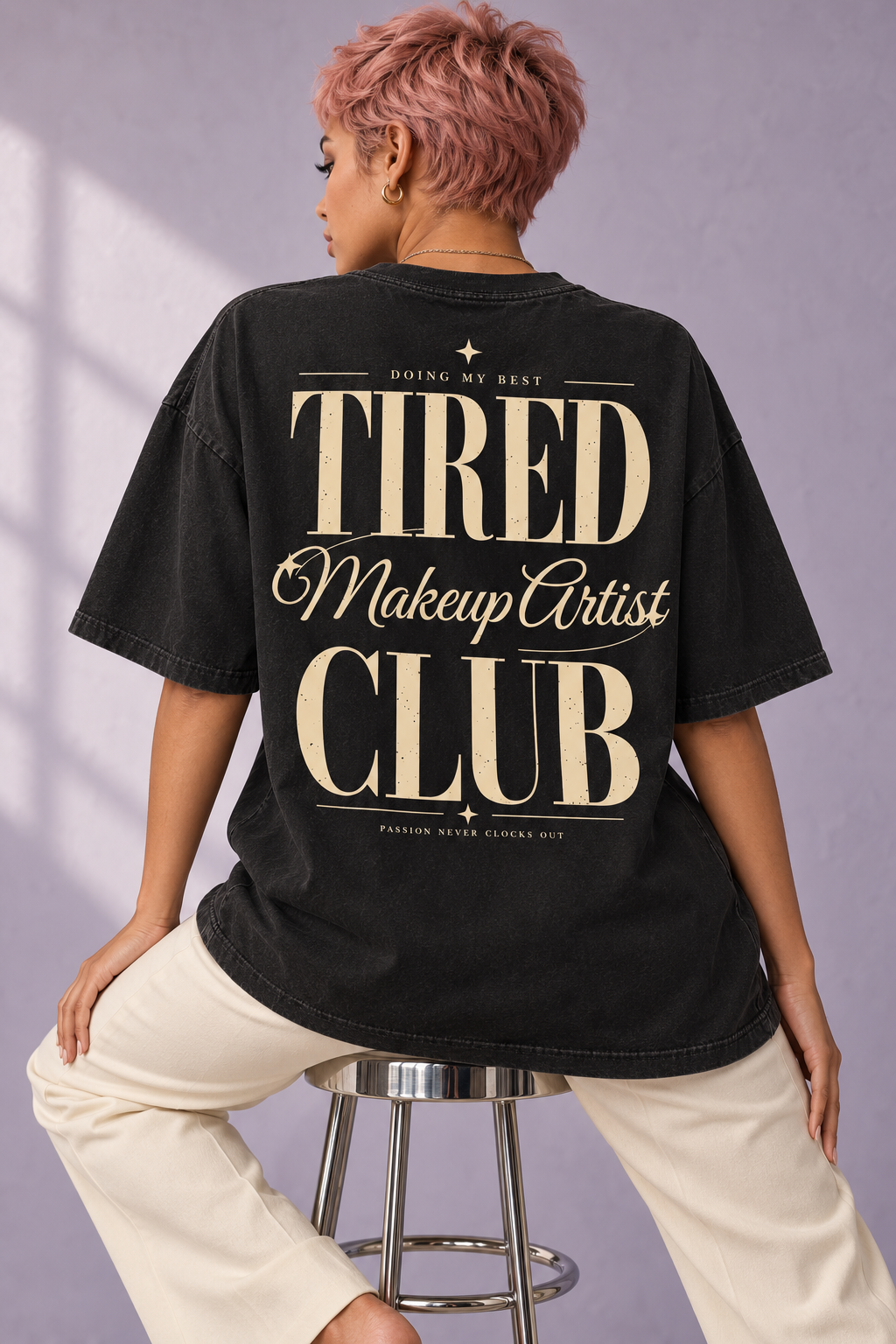 Tired Makeup Artist Club — T-shirt noir porté de dos, mockup lifestyle