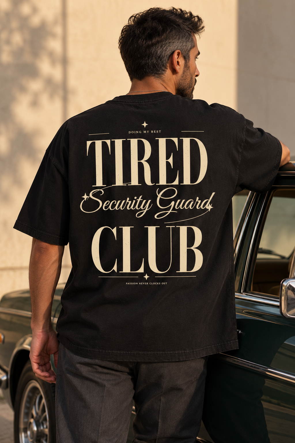 Tired Security Guard Club — T-shirt noir porté de dos, mockup lifestyle